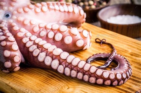 Whole Fresh Raw Octopus With Tentacles Closeup Stock Photo By Nblxer