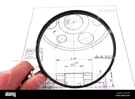 Reviewing Technical Drawing With Magnifying Glass Focus On Technical