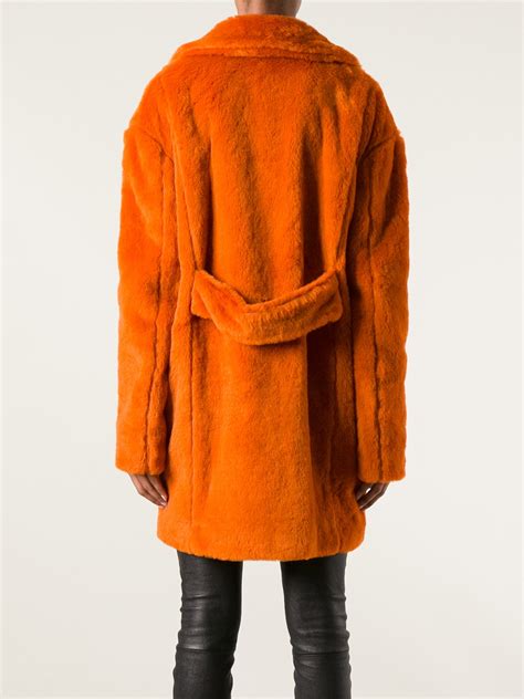 Lyst Msgm Faux Fur Coat In Orange