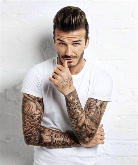 A year later, beckham was back at the tattoo studio, this time for a giant guardian angel on his upper back. David Beckham Tattoos - WeNeedFun