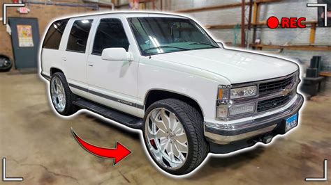 This Custom Tahoe With A Custom Pearl Paint Job Sitting On 26s Is Super