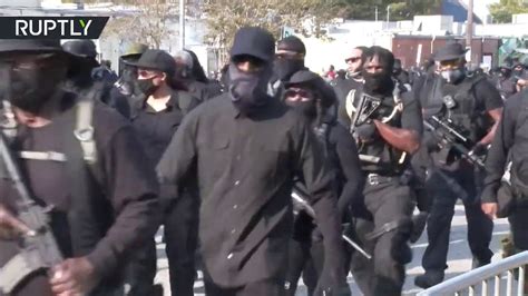 All Black Nfac Militia Members March On Lafayette In Armed Rally
