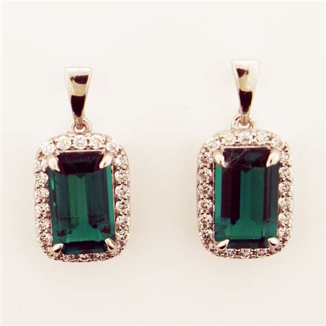 14k White Gold Emerald And Diamond Dangle Earrings Golden Creations