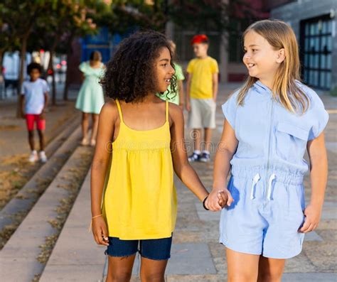 Two Tween Girls Walking Around City In Summer Stock Image Image Of