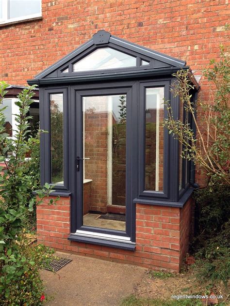 Enclosed porch elite three season room in white with glass knee wall enclosing an existing front porch. Grey on White upvc Porch classical design … | Front porch ...