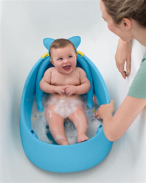 Once your baby outgrows the mesh sling, they can lay or sit comfortably and safely in the ergodically designed baby bath tub. Moby Smart Sling 3-Stage Tub | Skiphop.com
