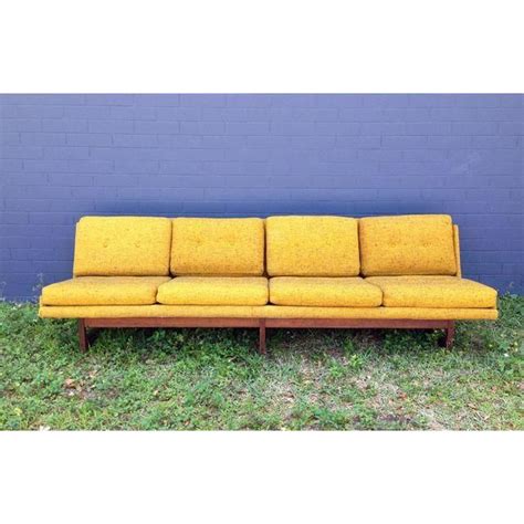 Case goods, tables, chairs, sofas, footstools and more can all be made to feel a bit more sleek with these slender legs. Image of Mid-Century Yellow Armless Sofa With Teak Legs | Midcentury modern, Mid century modern ...