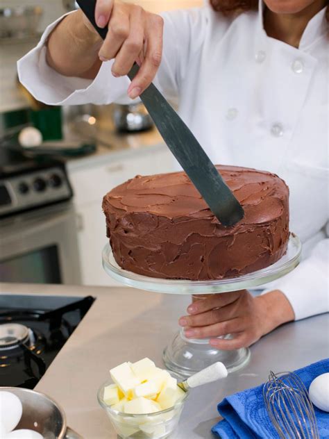 To make dots , hold the bag vertically with the nozzle close to the surface, squeeze a little icing out to make a dot the desired size, then to finish, stop squeezing, push down and then draw up sharply. Bake a Cake From Scratch | HGTV