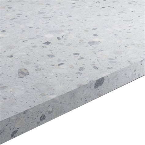 This kitchen design makes use of the great natural light and blends two neutral colours on the cabinetry for a bright, airy feel. 22mm Algiata Matt Grey Stone effect Chipboard & laminate ...