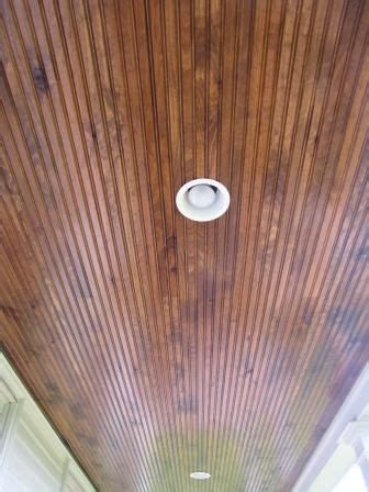 The bead board ceiling is finished and looks amazing! Beaded pine wood ceiling panels for porch. | Porch ceiling ...