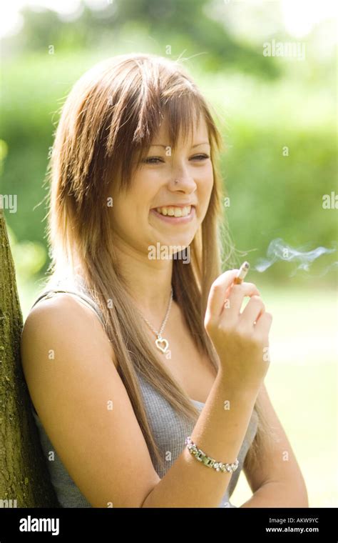 A Teenage Girl Smoking A Cigarette Stock Photo 8616059 Alamy