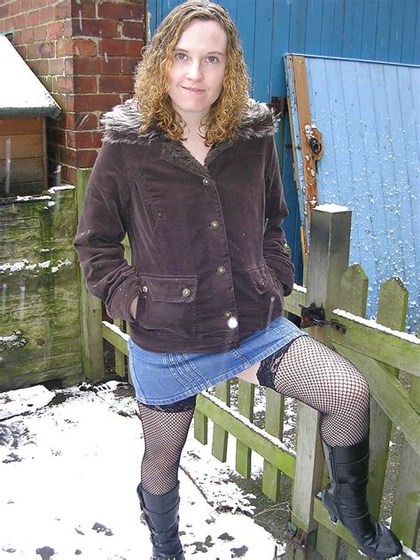 Flashing In The Snow Stockings And Boots Photo