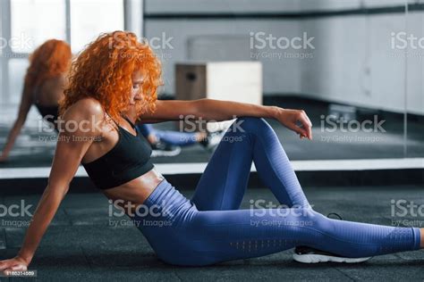Sporty Redhead Girl Have Fitness Day In Gym At Daytime Muscular Body