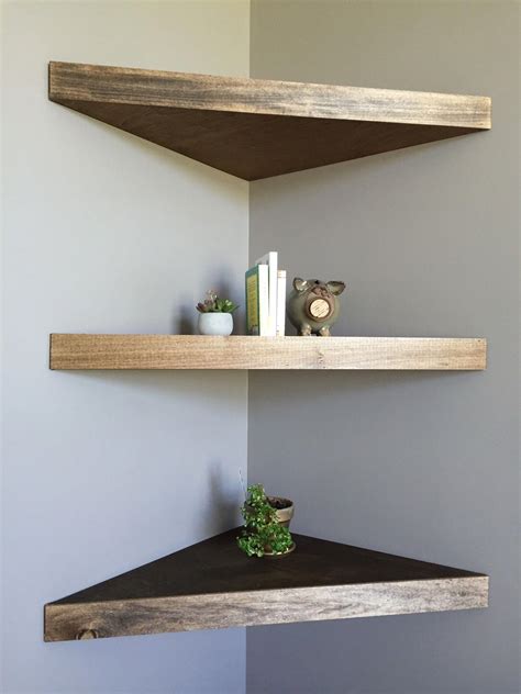 Squeeze extra storage into a bathroom or laundry by placing floating wall shelves that are space efficient right at that empty corner. diy floating corner shelves | Wood corner shelves ...