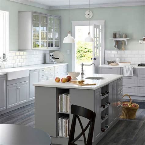 4 white kitchen cabinets with dark flooring. 12 Inspiring Kitchen Island Ideas — The Family Handyman