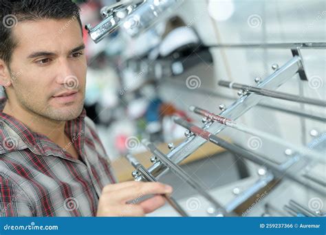 Man Viewing Metal Rack Stock Photo Image Of Factory 259237366