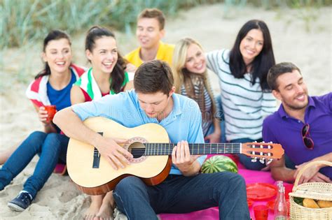 She was my best friend… the song was perfect by ed sheeran. Group Of Friends Having Fun On The Beach Royalty Free Stock Photos - Image: 34601698
