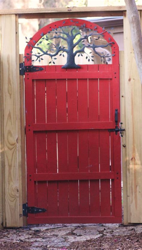 Looking for a way to spiff up your wrought iron gate or fence? Gates, Tree of life and Garden gates on Pinterest