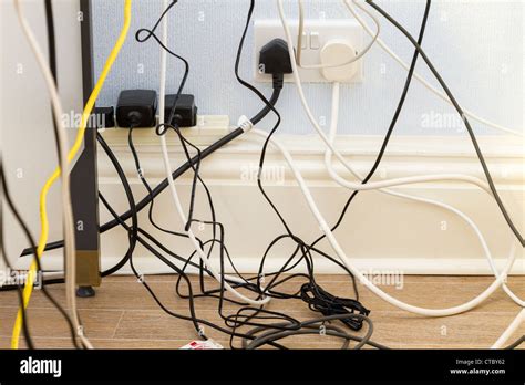 Untidy Office Cables And Wires Stock Photo Alamy