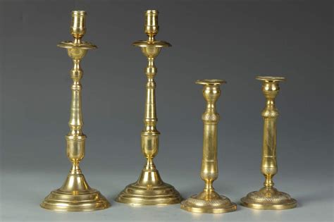 2 Pair Of Brass Candle Sticks Cottone Auctions