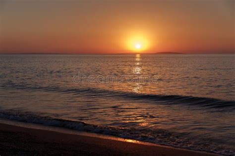 Sea Coast At Sunset With The Sun Wave Orange Sky Stock Photo Image