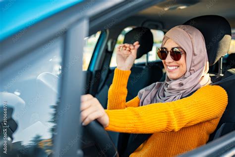 Beautiful Muslim Woman Driving A Car Wearing Hijab Emirati Woman Driving A Car In Dubai At