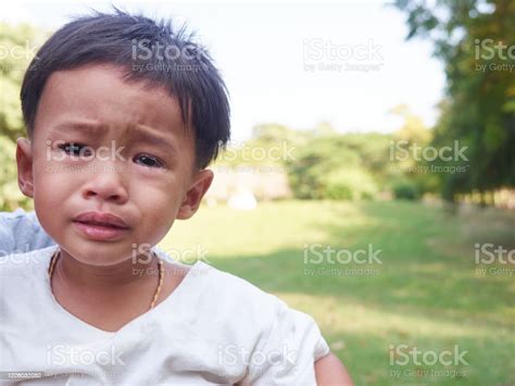 Portrait Of A Crying Little Boy Tear On Eye Of Unhappy Boy Stock Photo