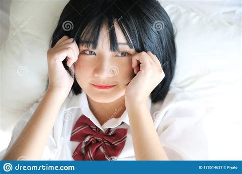 portrait of asian girl with white shirt and skirt in closeup stock image image of cheerful