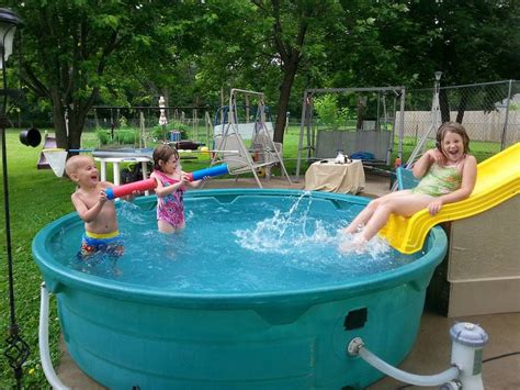 Do it yourself pool slide. Stock tank pool complete with salt water filter system ...