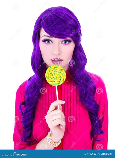Portrait Of Young Beautiful Woman With Purple Hair Lollipop And Stock