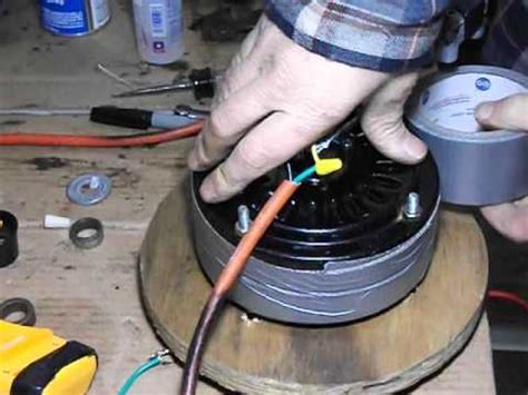 Most ceiling fans are induction motors, that don't generate electricity when being turned. Ceiling Fan Wind Generator Rebuild 11 - YouTube