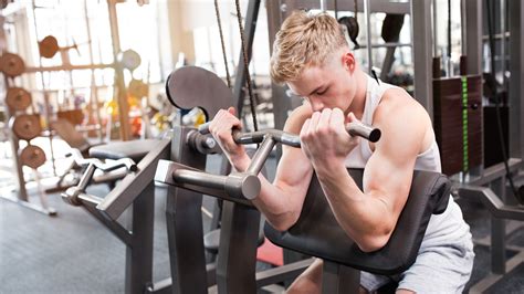 why you should avoid the bicep curl machine at the gym