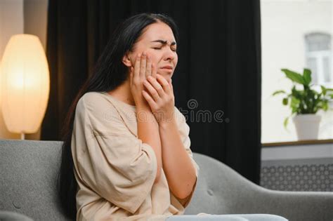 Attractive Young Woman Suffering From Toothache Woman Holding Her