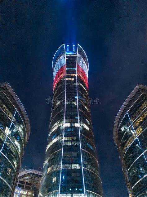Warsaw Spire Tower At Night With Glowing Polish Flag On Top Editorial