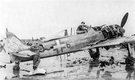 American Officers Are Posing In Front Of A Captured Focke Wulf Fw 190a