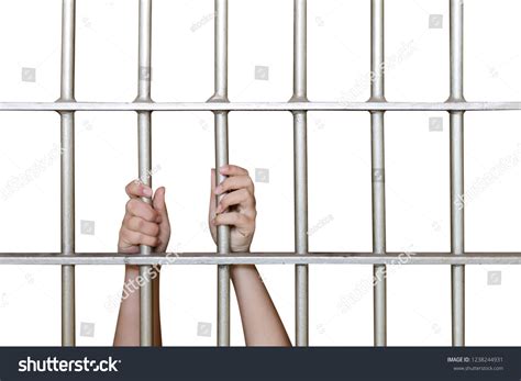 Hands Prisoner On Prison Bars Stock Photo 1238244931 Shutterstock