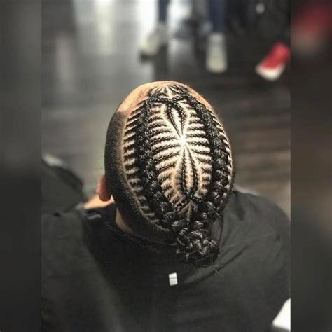 Mini man bun + braid. Pin on hair