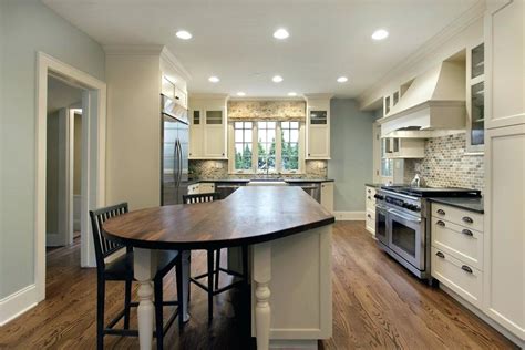 A kitchen island is a really useful addition to a kitchen and might be used for any number of activities: Licious Curved Kitchen Island Bar With Raised Breakfast ...