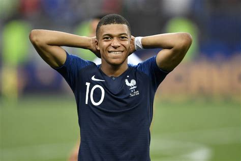 kylian mbappe smiling