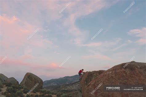Man Climbing Rock In Buttermilk Country — Landscape Male Stock Photo