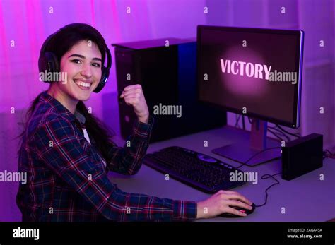 Female Pro Gamer Win Online Game On Computer Stock Photo Alamy