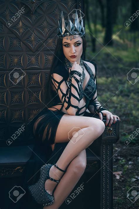 Dark Evil Queen Sitting On A Luxurious Throne Wild Princess Stock