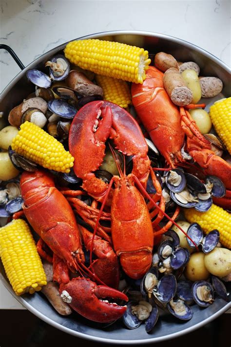 In large stock pots, bring water to a boil with a few teaspoons of salt. Maine Lobster Boil | Lobster boil, Seafood boil, Lobster ...