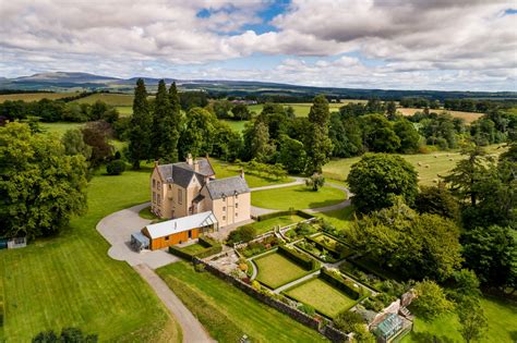 A Spectacularly Renovated Baronial Home Set In Lush Grounds In Scotland