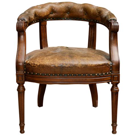 Chairs as well as table are super solid, heavyweight. Tufted Leather and Mahogany Barrel-back Library Chair ...