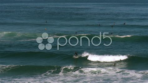 European surfer takes a wave in the Atlantic Ocean 06 Stock Footage,#takes#wave#European#surfer 