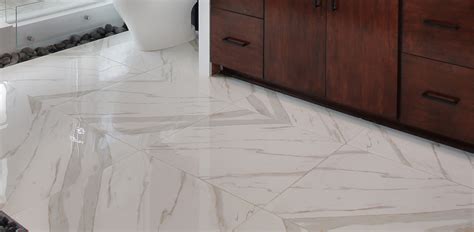 It is available in slabs with a polished finish and is recommended for interior projects including walls, backsplashes, countertops, and flooring. Bathroom Countertop | Quartz Arctic White