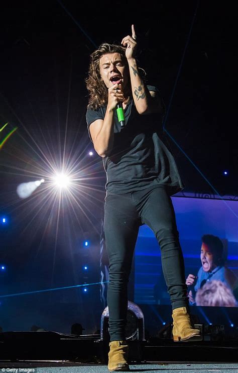 Check spelling or type a new query. One Direction's Harry Styles is hit in the face by drinks ...
