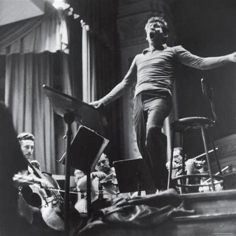 Maestro Leonard Bernstein Conducting The Ny Philharmonic Orchestra For