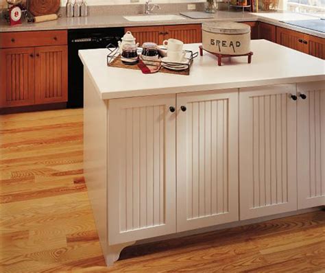 Mixed with paint, it creates a light stain. Beadboard Kitchen Cabinets - Decora Cabinetry